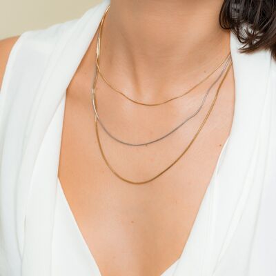 Gold and silver triple chain necklace