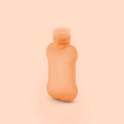 Pee-wash design bottle in soft orange silicone