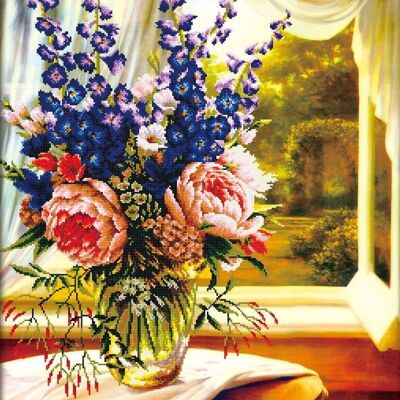 Floral vase by the window