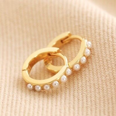 Pearl Studded Huggie Hoop Earrings in Gold