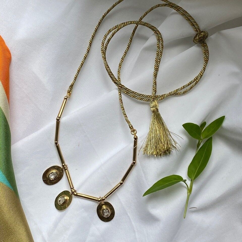 Collar Param con medallas bañadas en oro