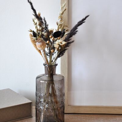 Bouquet of dried flowers in vase Black