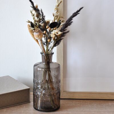 Bouquet of dried flowers in vase Black