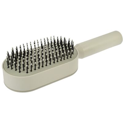 "Easy Clean" hairbrush, made of plastic, white