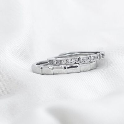 Set di anelli coordinati per l'eternità con promessa regolabile per coppia in argento