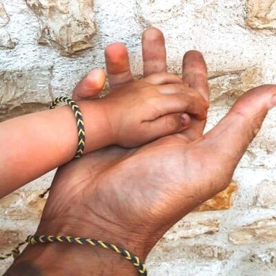 Duo of matching bracelets dad and child