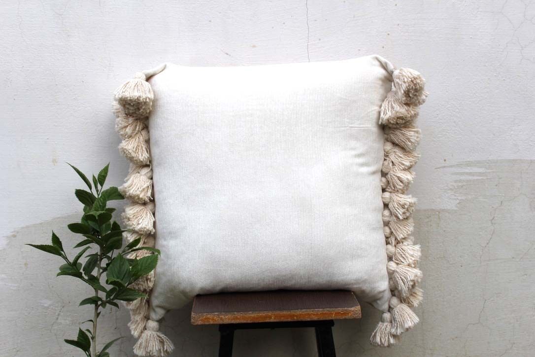 Housse de coussin en chenille blanc cassé