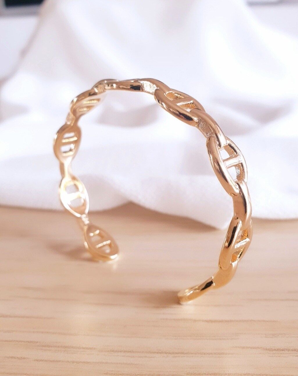 Jonc en plaqué or motif "grain de café"