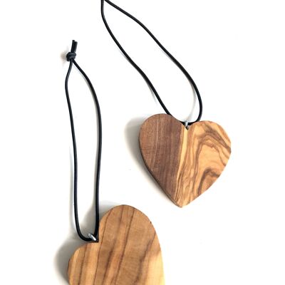 Air freshener hanging for the car as a heart of olive wood