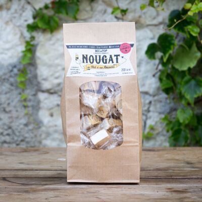 Traditional nougat in papillotes with honey and almonds