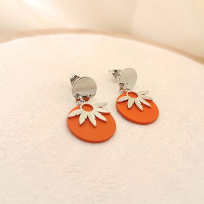Orange dangling earrings with flower