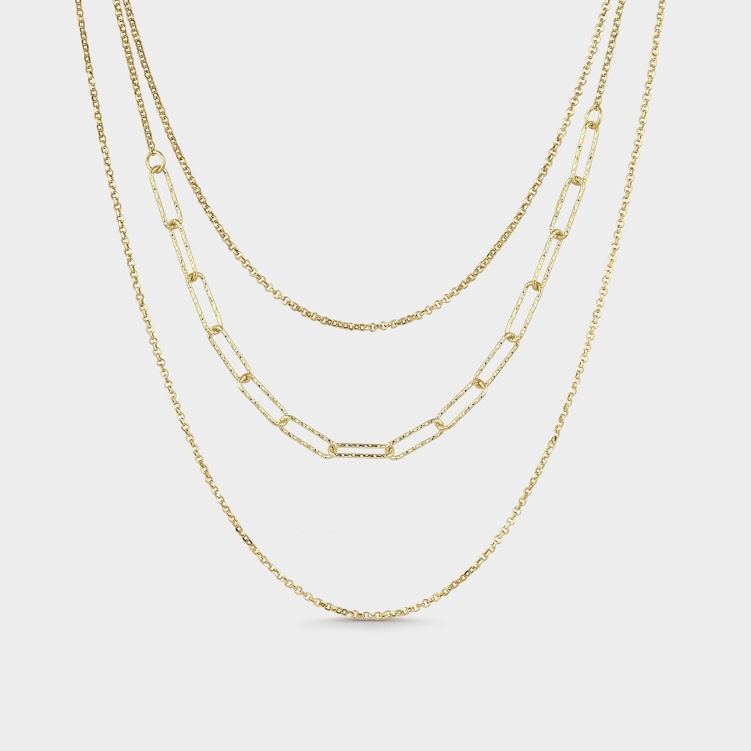 Collana tripla testurizzata in argento placcato oro.