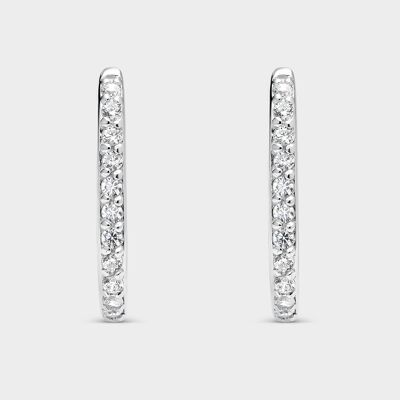 Silver earrings with oval white zircons