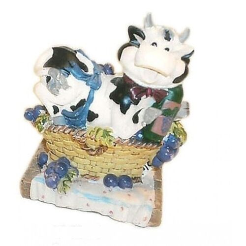 Napkin holder with cow.