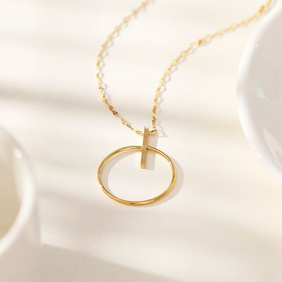 Golden circle and bar necklace