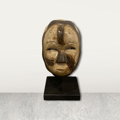 Small African mask on stand