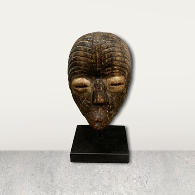 Small African mask on stand