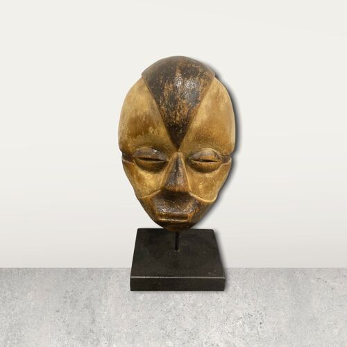 Small African mask on stand