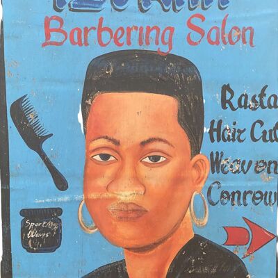 Segni del negozio di barbiere africano dell'annata