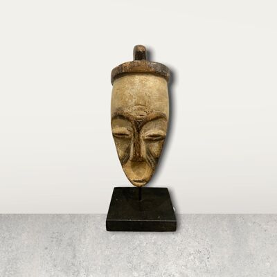 Small African mask on stand