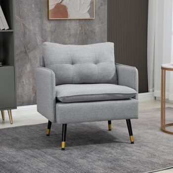 Fauteuil style art-déco dossier effet capitonné piètement incliné effilé métal noir extrémités dorées tissu gris 2