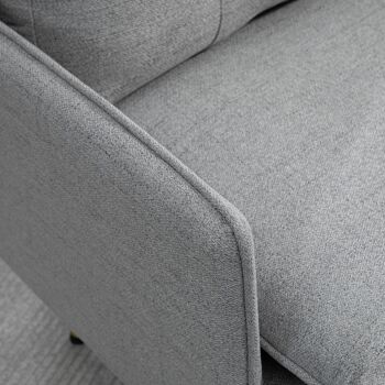 Fauteuil style art-déco dossier effet capitonné piètement incliné effilé métal noir extrémités dorées tissu gris 4