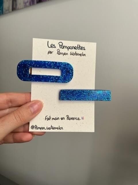 Pompette di paillettes blu petrolio