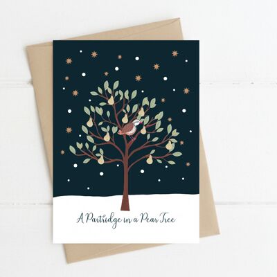Ein Rebhuhn in einer Birnbaum-Weihnachtskarte