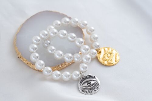 Big white pearl bracelet with eye coin