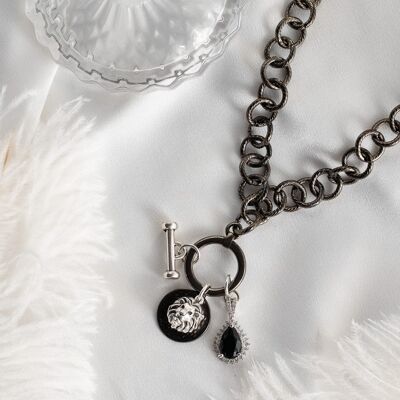 Black chain necklace with silver charms