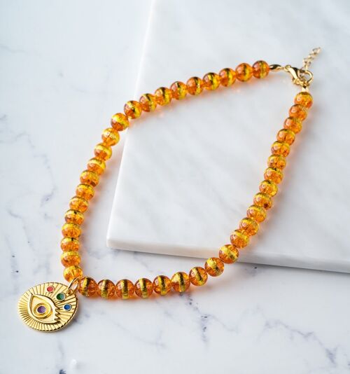 Evil eye orange beads necklace