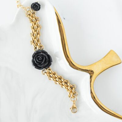 Gold bracelet with black rose