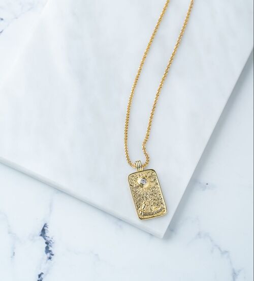 Gold chain with tag