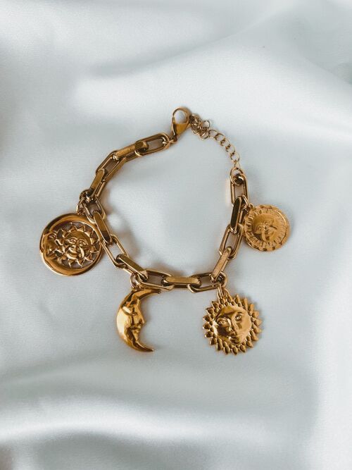 Gold sun and moon charm bracelet