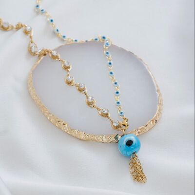 Long gold delicate necklace with evil eyes