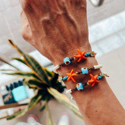 Orangefarbene Sommer-Seestern-Armbänder