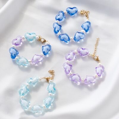 Bracelets de perles avec des coeurs colorés