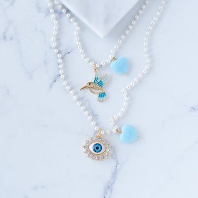 Collares perlas rosario charm con ojo y pájaro