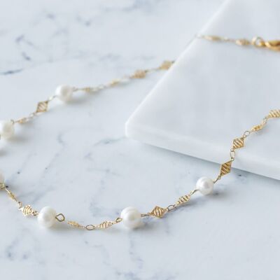 Collier court rosario perle en or