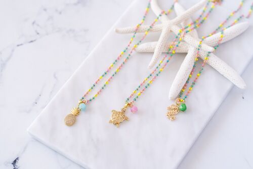 Rainbow rosario necklace with exotic pendants