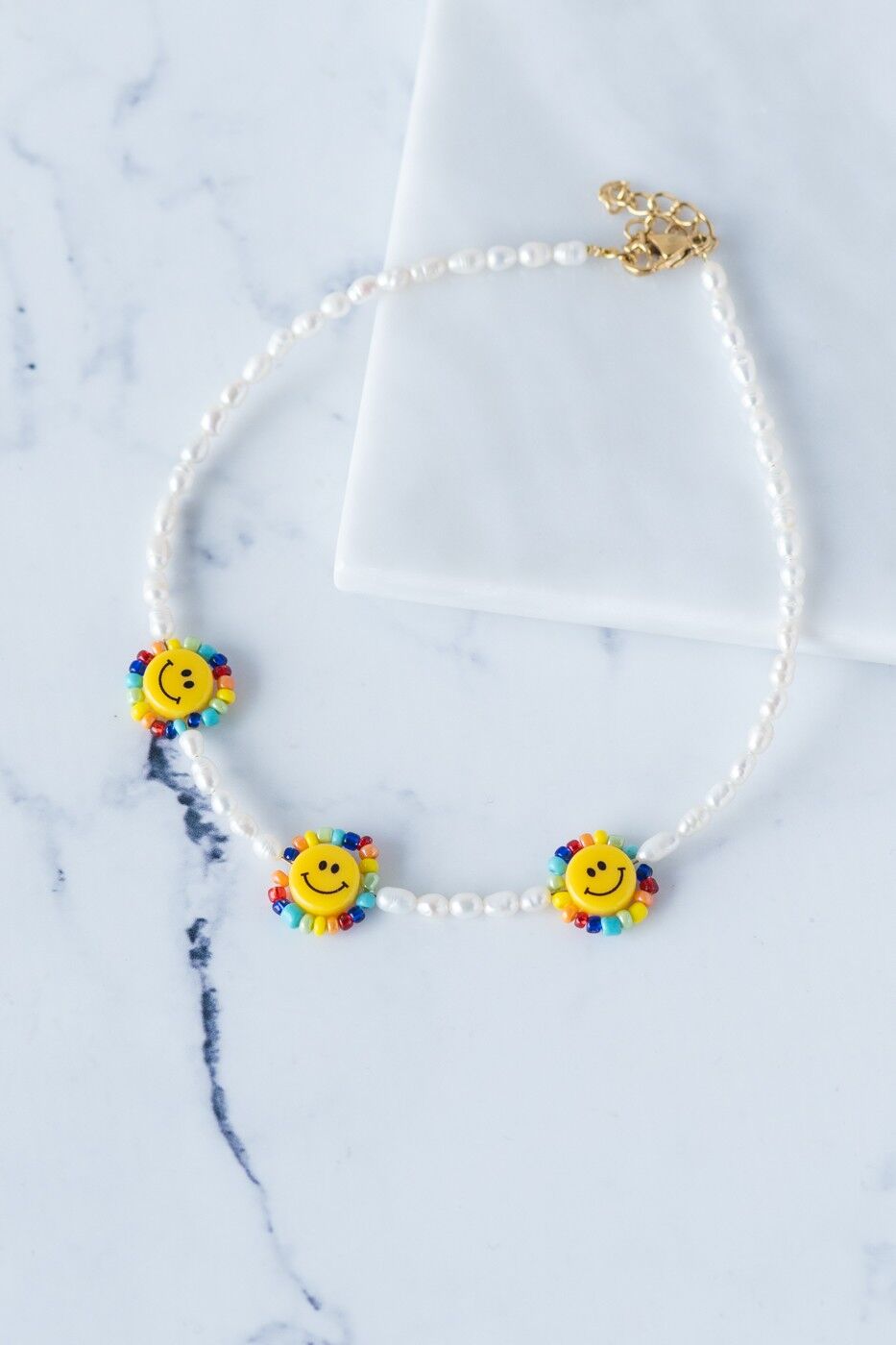 Smiley flower face pearl choker