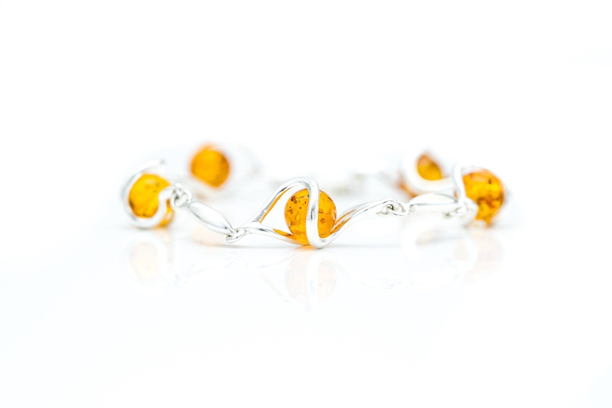 Brazalete de orbe de remolino de plata