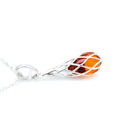 Pendentif ambre en forme de larme en cage