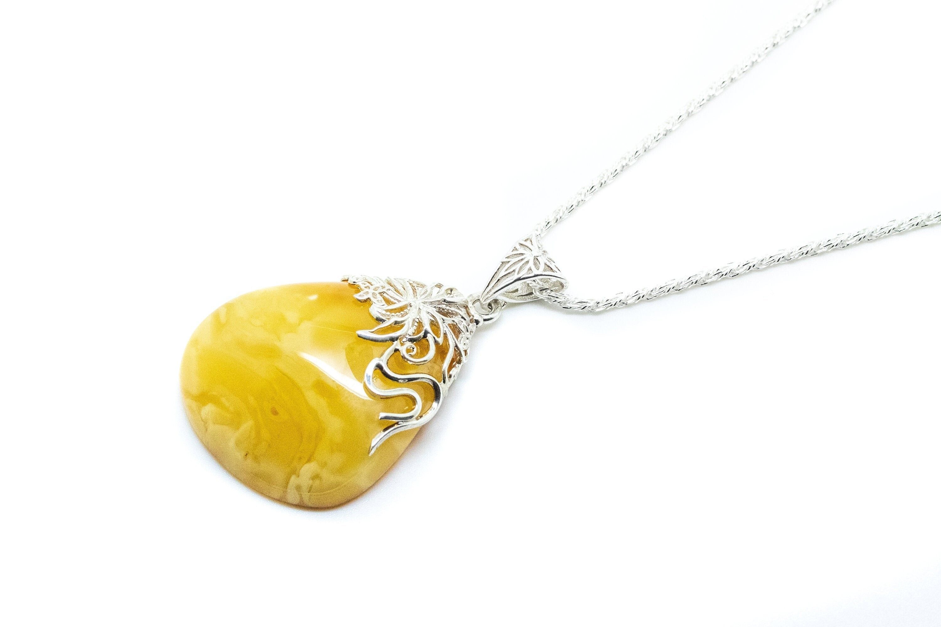 Colgante asimétrico adornado de ámbar caramelo OOAK