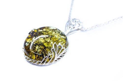 Elegant Silver and Large Green Amber Pendant