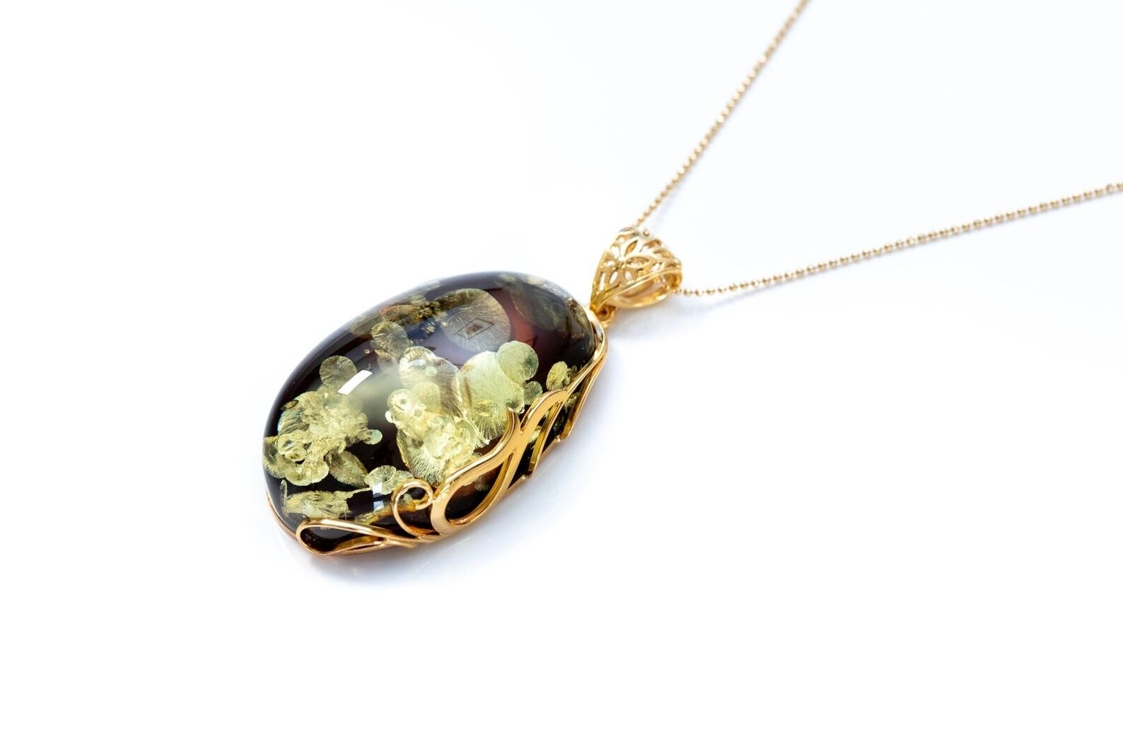 Colgante de ámbar verde con borde dorado OOAK