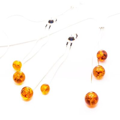 Set di gioielli moderni con sfera in ambra