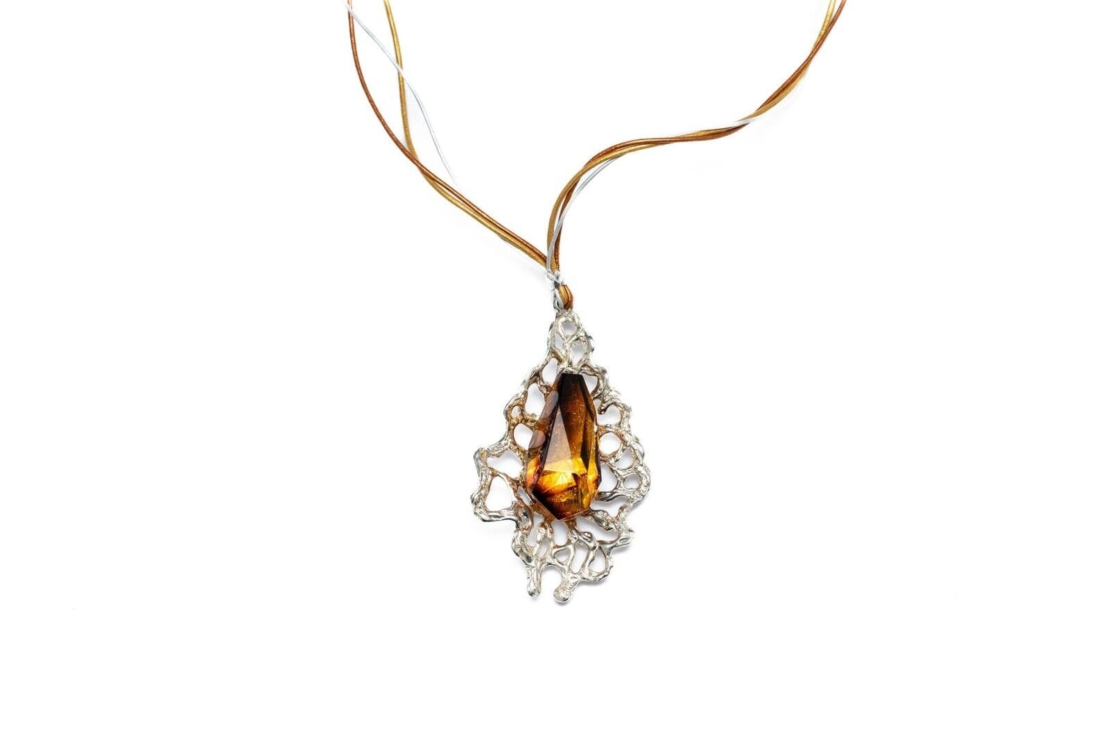 Ciondolo sfaccettato OOAK con traforo in argento
