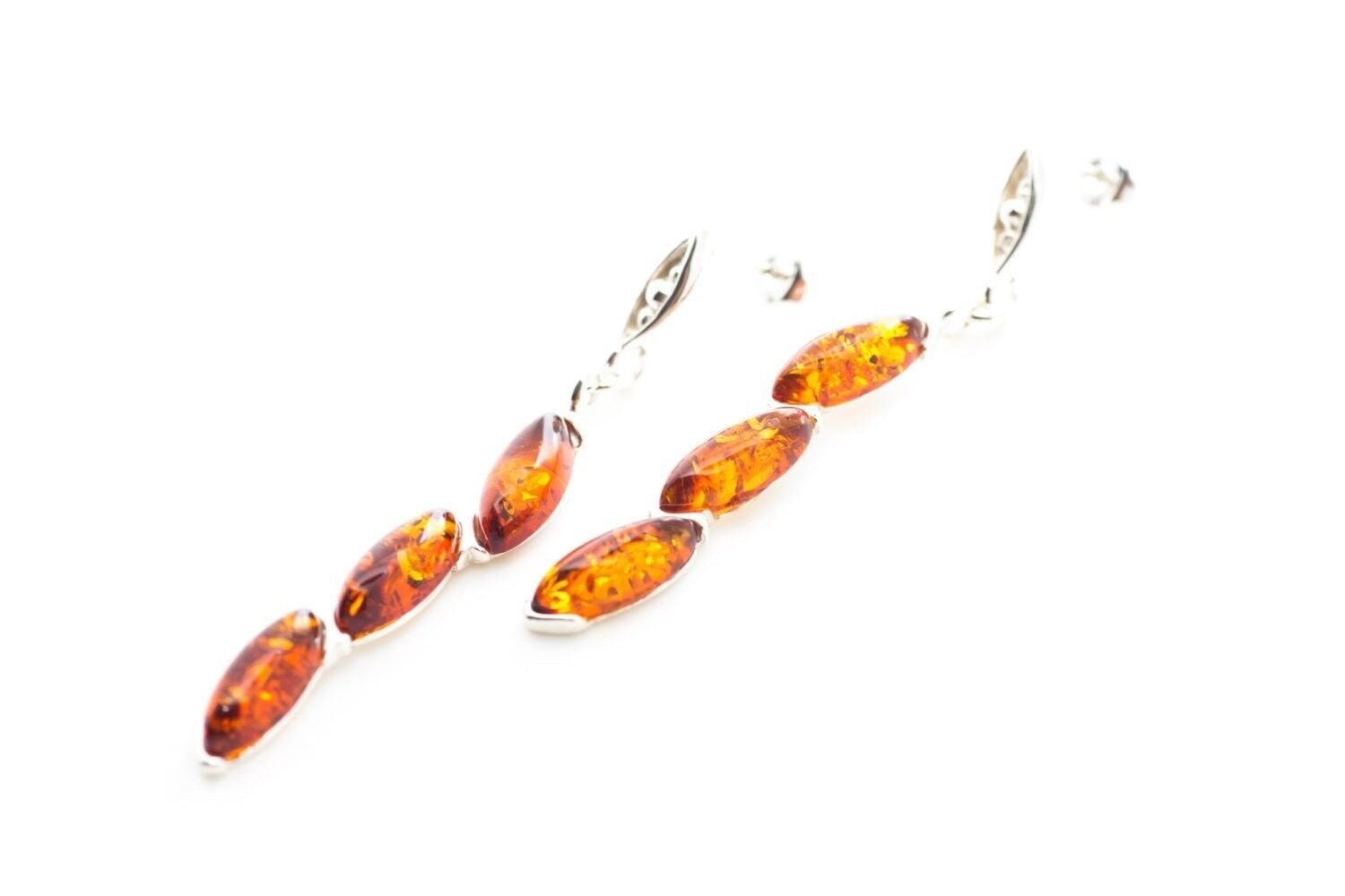 Orecchini pendenti rigidi in ambra