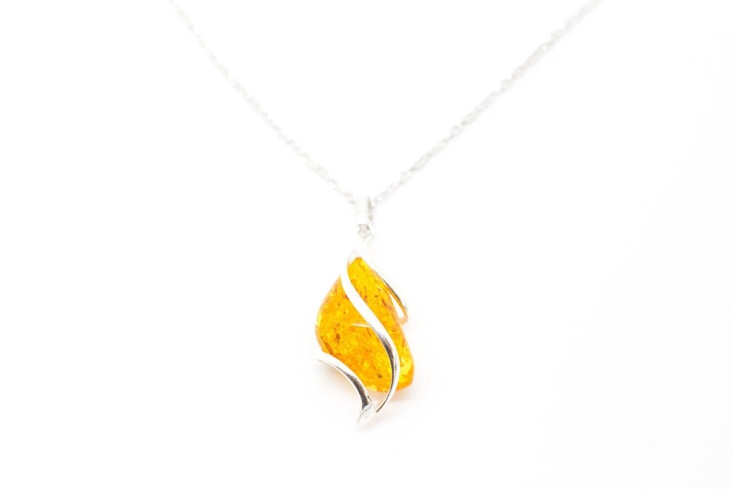 Ciondolo Swirly in ambra e argento